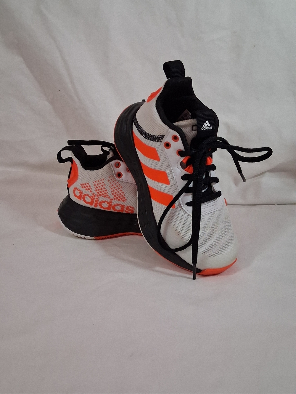 Adidas OwnTheGame 2.0 Basketball Shoes.
